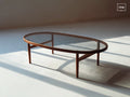 Couchtisch aus Rauchglas und Holz 130×70×42 cm - Rauchgrau/Dunkelbraun - ovale Wohnzimmerform